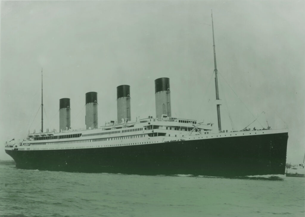 The Titanic at sea with a green overlay.