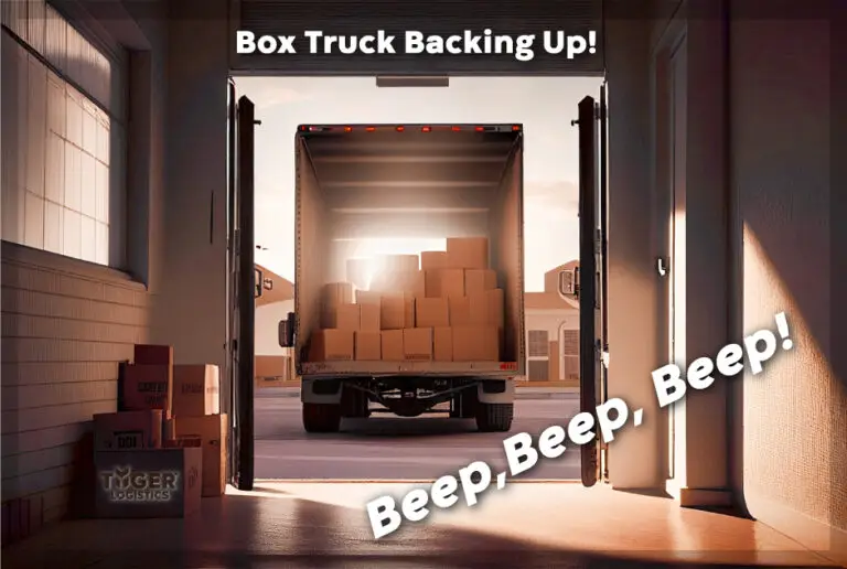 "Truck Backing Up - Beep, Beep, Beep! - Tyger Logistics®" An image of a brown truck backing into a warehouse.