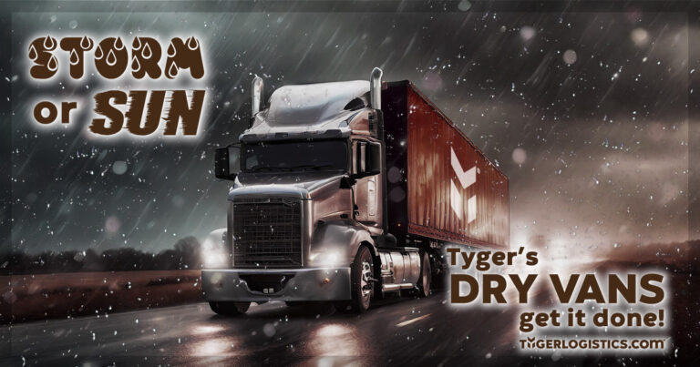 Tyger Times -Blogs and News - "STORM or SUN, Tyger's DRY VANS get it done! - tygerlogistics.com - A Silver Semi Truck is pulling a brown Dry Van with a white Tyger Logistics "Y" logo through a rain storm at night on the interstate with the lights on.