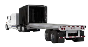 What is a flatbed trailer? There are different types of flatbed trailers. This one is a conestoga trailer.